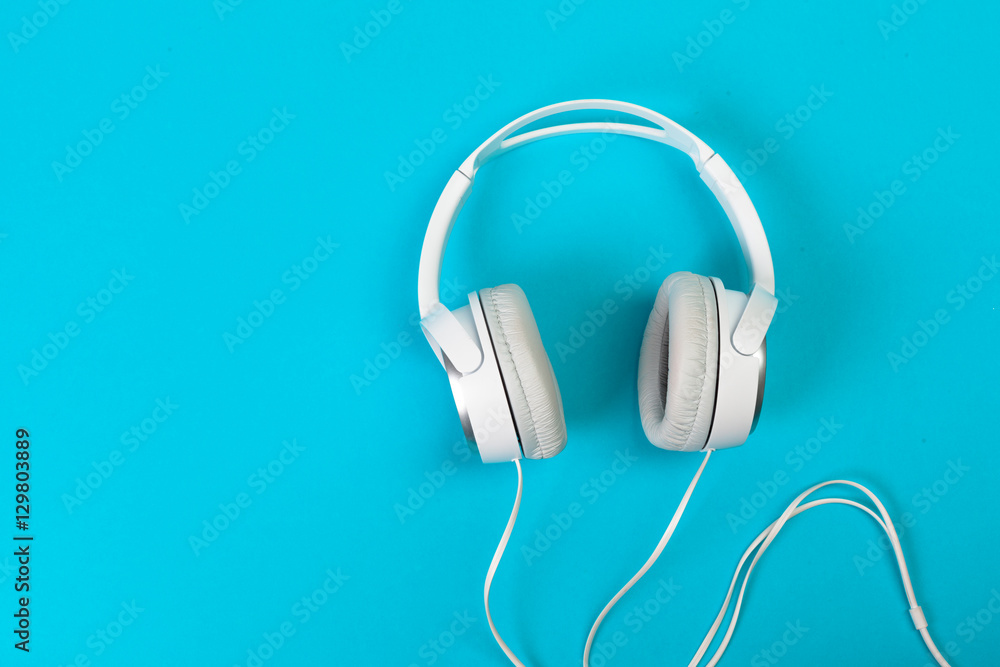 Headphones on blue background Headphones on blue background