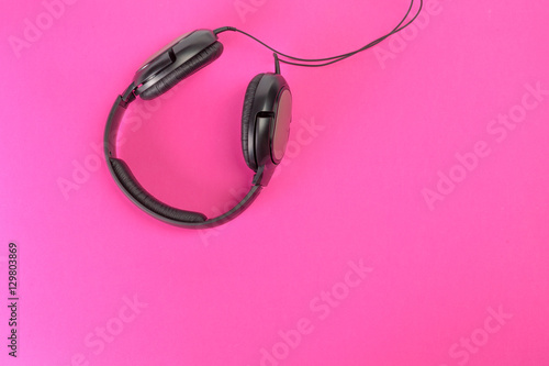 headphones on pink background