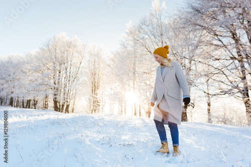 Beautiful young woman laughing outdoors. Enjoying nature, winter © Myvisuals