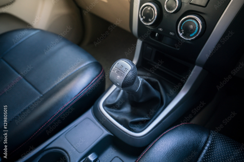 manual transmission in car - gearstick, manual gear shift knob.