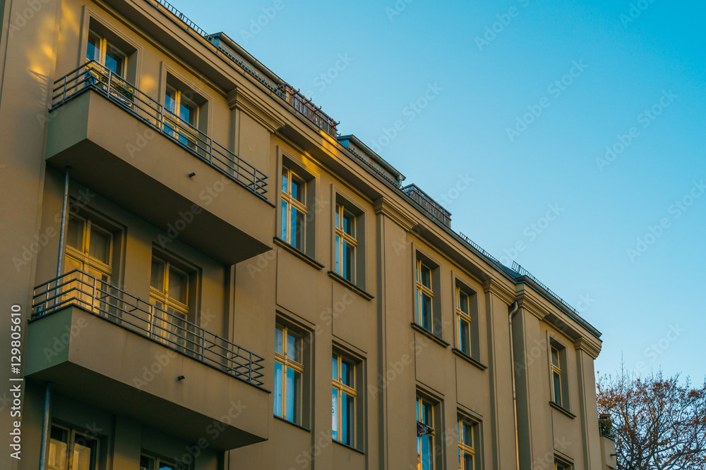 Fototapeta premium orange and beautiful apartment building
