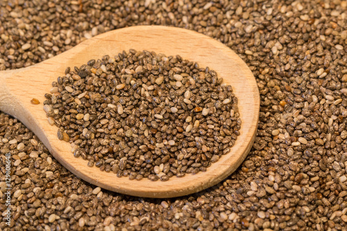 chia seeds with wooden spoon