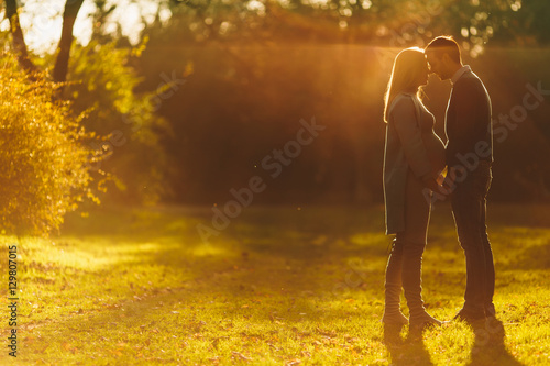 Happy couple in autumn park