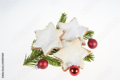 Christmas cookies and fir branch ilsolated photo