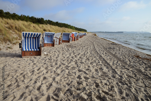 Fototapeta Naklejka Na Ścianę i Meble -  Beach chairs on the Baltic Sea beach at Thiessow, Germany