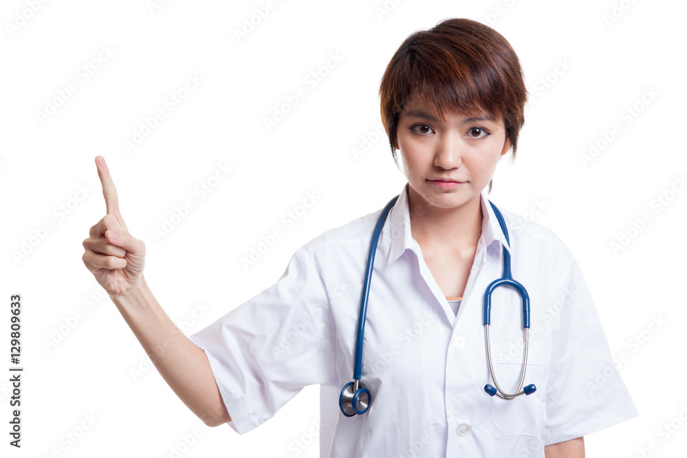 Asian young female doctor point to blank space. Asian young female doctor point to blank space.