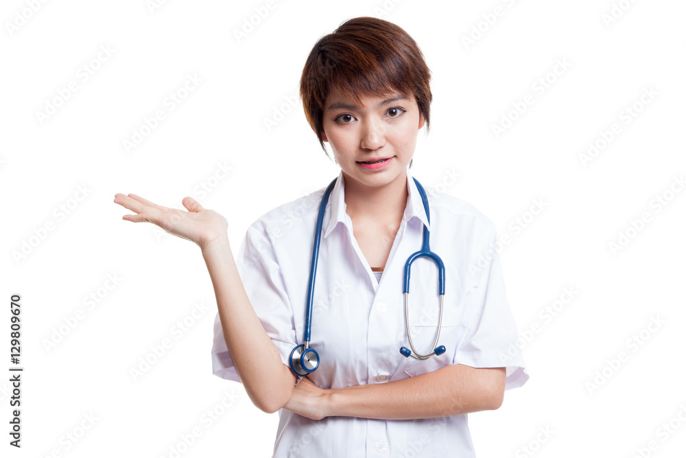 Asian young female doctor show something on her hand. Asian young female doctor show something on her hand.