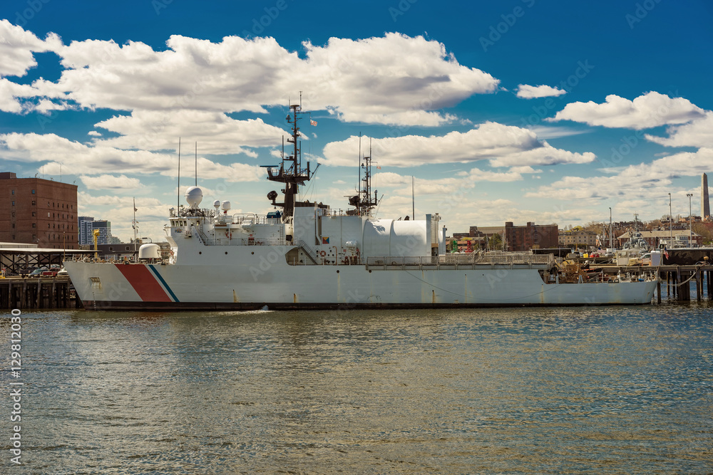 Big white ship moored in the harbor in Boston