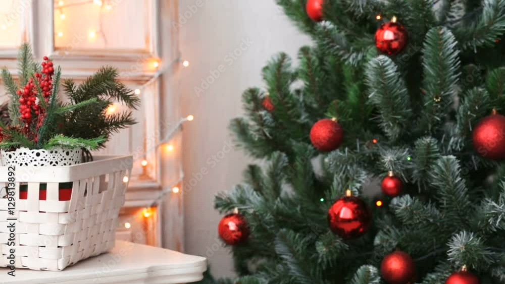 Cristmas tree with red toys on lights background Cristmas tree with red toys on lights background