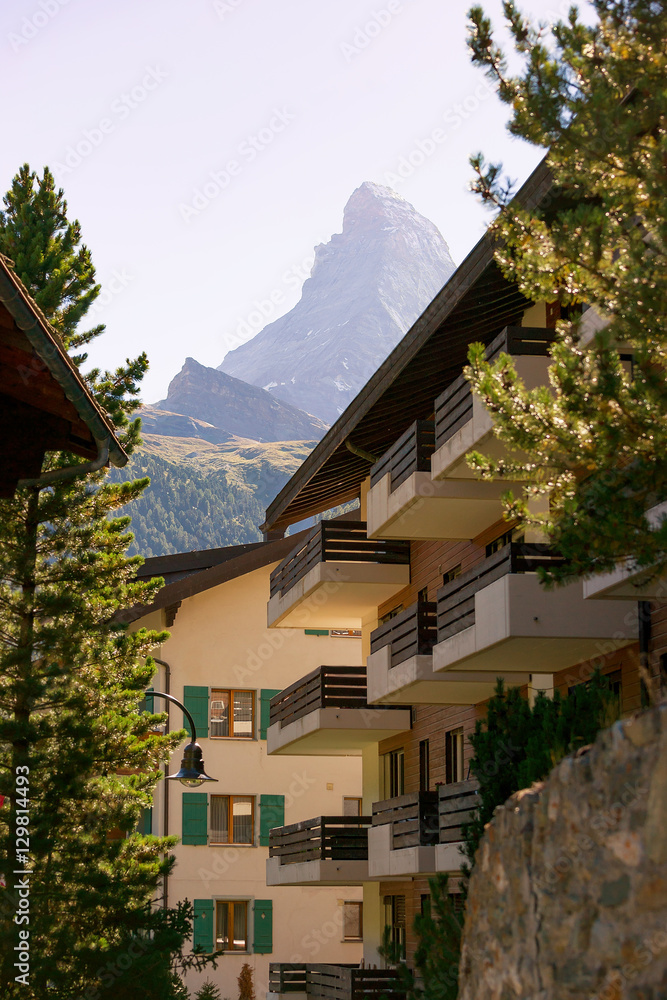 Chalets of resort city Zermatt with Matterhorn mountain of Switzerland