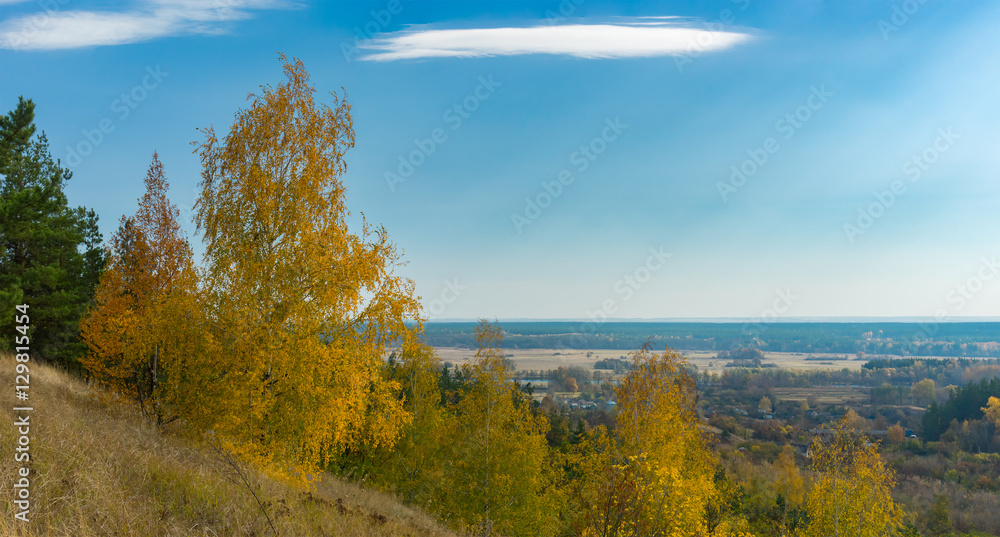 Fototapeta premium Seasonal landscape with view on Chervlene village from nearest hill, sumskaya oblast, Ukraine