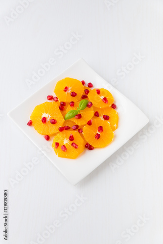 Fresh citrus salad with oranges and pomegranate seeds.