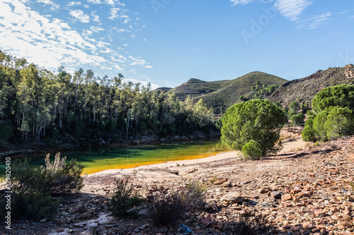 Gorgeous panoramic view ol Odiel river in antique exploitation of copper mine in village Sotiel Coronada in  Huelva, Andalusia, Spain photo