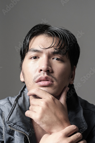 Portrait of Asian man in the jacket - Head shot