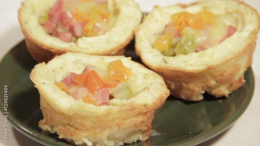 Delicious breakfast in potato basket with sausage, cucumber, bell pepper and cheese. Delicious breakfast in potato basket with sausage, cucumber, bell pepper and cheese.