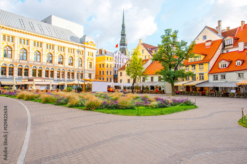 Livu square with beautiful flowerbed and buildings in the old town of Riga, Latvia Livu square with beautiful flowerbed and buildings in the old town of Riga, Latvia