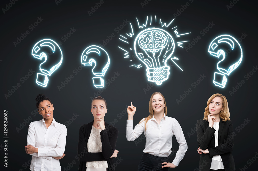Four women brainstorm. Black wall. Sketches Four women brainstorm. Black wall. Sketches