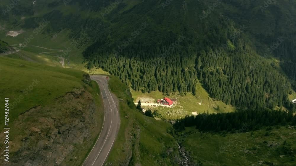 Aerial shot over famous Transfagarasan serpentine mountain road connecting Transylvania and Muntenia Aerial shot over famous Transfagarasan serpentine mountain road connecting Transylvania and Muntenia