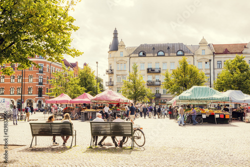 Sweden, Skane, Malmo, Mollevangen, Mollevangstorget, Market on town square photo