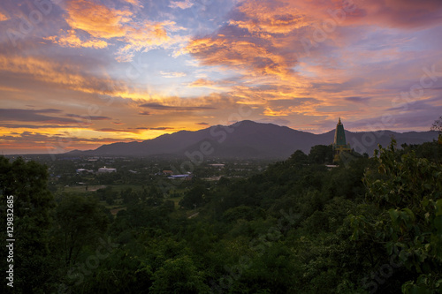 beautiful landscape sun rising sky and buddha pagoda in chonburi