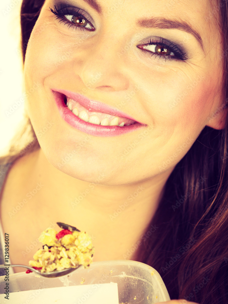 Woman eat oatmeal with dry fruits. Dieting Woman eat oatmeal with dry fruits. Dieting