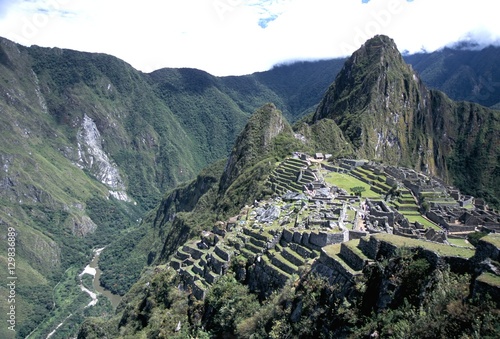 Ruins of Inca town site, seen from south, with Rio Urabamba below, Machu Picchu, Peru photo