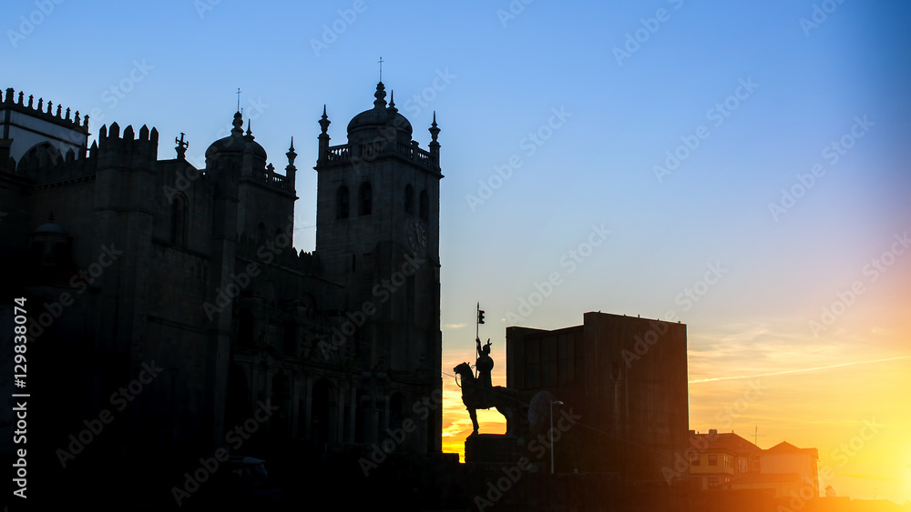 Silhouette of Porto Cathedral during sunset in the historical centre of Porto, Portugal. .