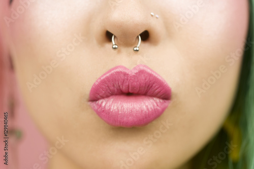 Canvas Print Young woman puckering her lips