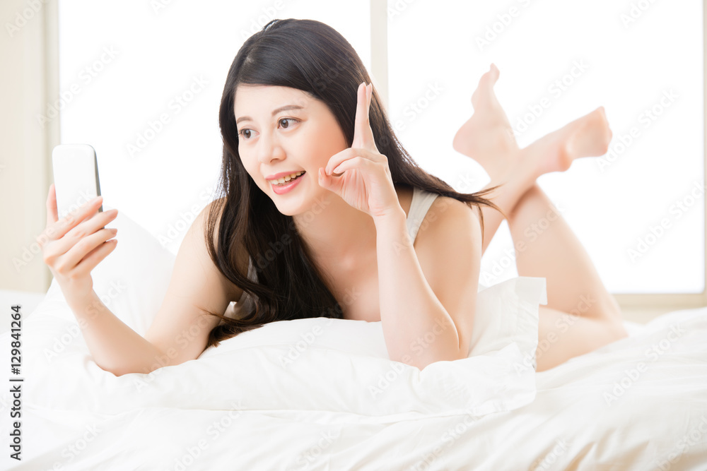 beautiful young asian woman taking selfie by smart phone beautiful young asian woman taking selfie by smart phone