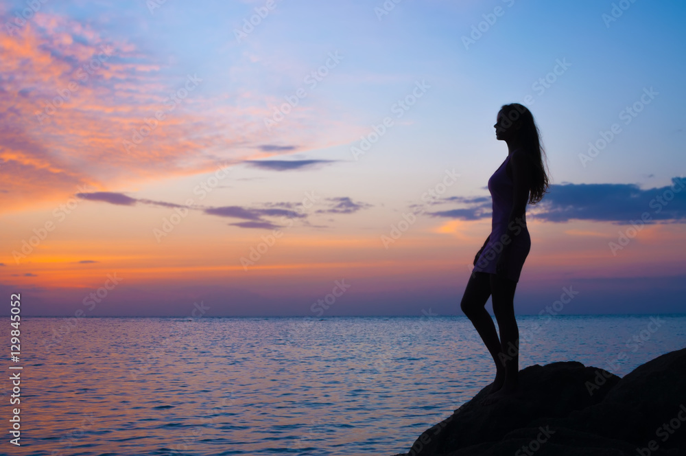 Girl looking sunset