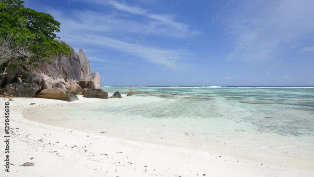Perfect beach Anse Source D'Argent in La Digue with turquoise water, granite boulders and coral reefs during low tide in the Seychelles.
Perfect beach Anse Source D'Argent in La Digue with turquoise water, granite boulders and coral reefs during low tide in the Seychelles.