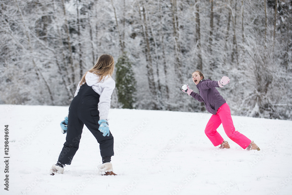 Snowball fight in winter