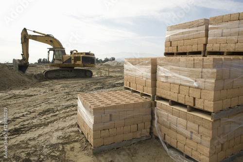 Pile of stacked bricks at construction site