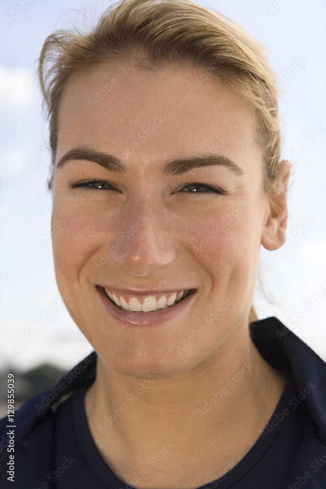 Close-up portrait of happy Caucasian female athlete Close-up portrait of happy Caucasian female athlete
