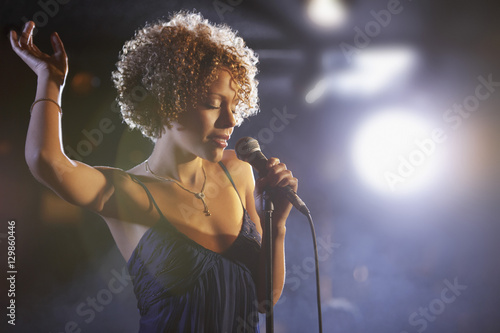 Photos Beautiful African American female jazz singer on stage