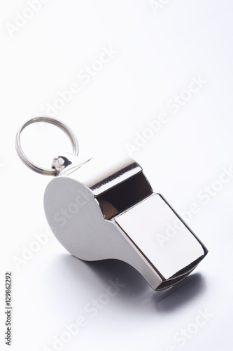 Closeup of whistle over white background