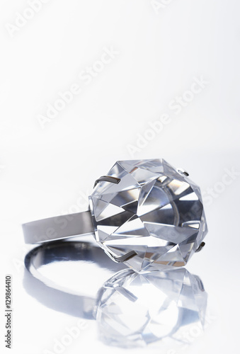 Closeup of diamond ring isolated over white background