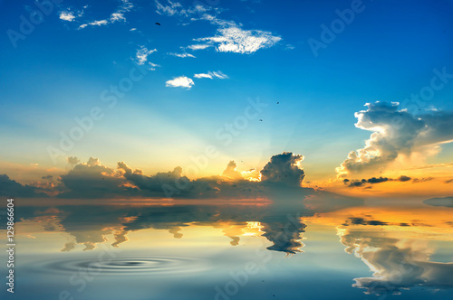 beach mirrors the sky at sunrise time © shahrilkhmd