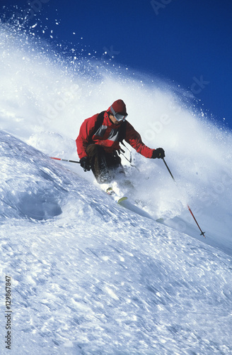 Full length of man skiing on mountain slope