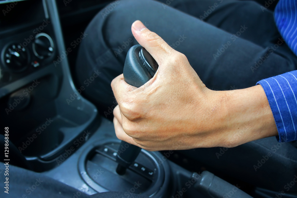 hand shifting the gear stick hand shifting the gear stick