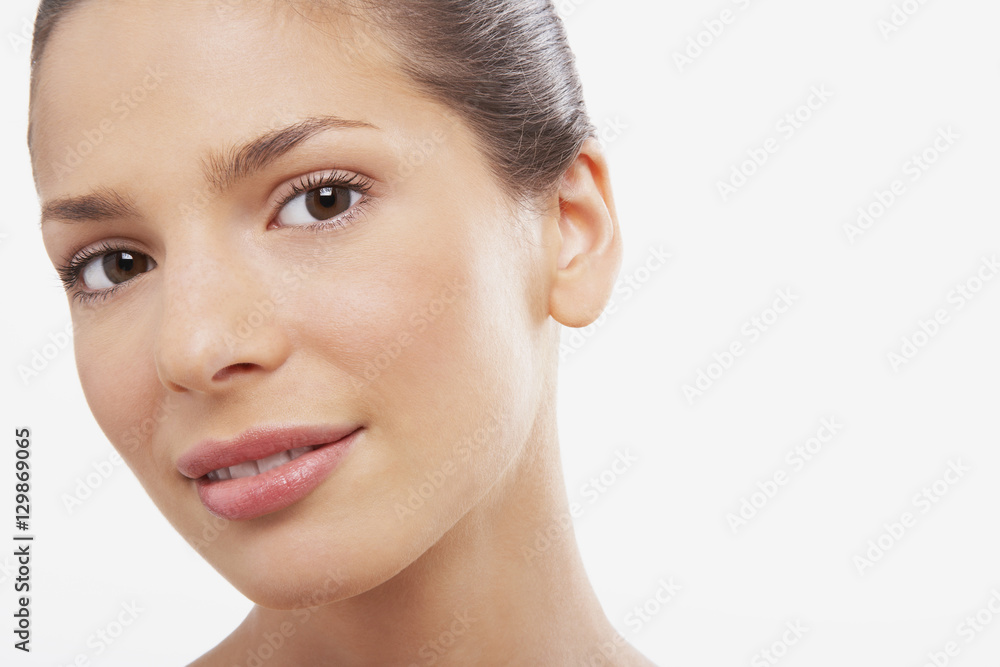 Closeup portrait of beautiful young woman on white background Closeup portrait of beautiful young woman on white background