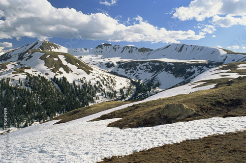 Snowy landscape in June, at Independence Pass, elevation 12095 ft, in the Sawatch Mountains, part of the Rockies, in Aspen, Colorado photo