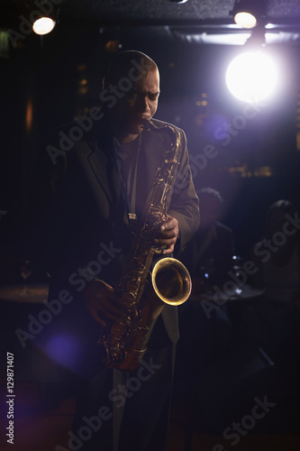Photography Musician playing saxophone in the jazz club