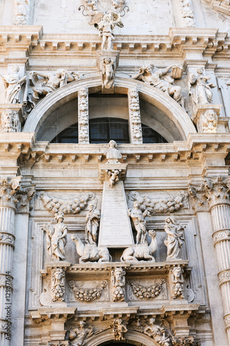 statue of Vincenzo Fini on facade church