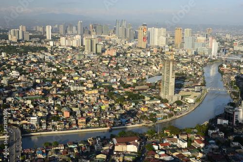 Tall buildings on Ortiga Avenue, Pasig River and Mandaluyong beyond, Metromanila, Philippines  photo