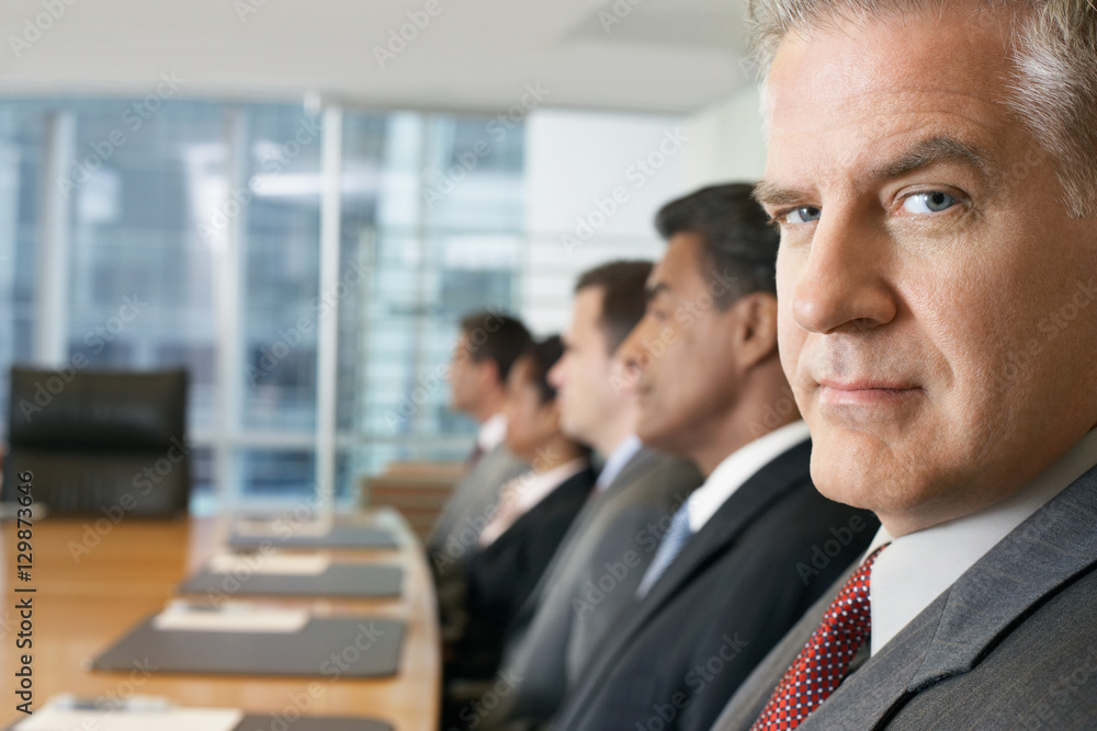 Multiethnic business people sitting in row at conference meeting Multiethnic business people sitting in row at conference meeting