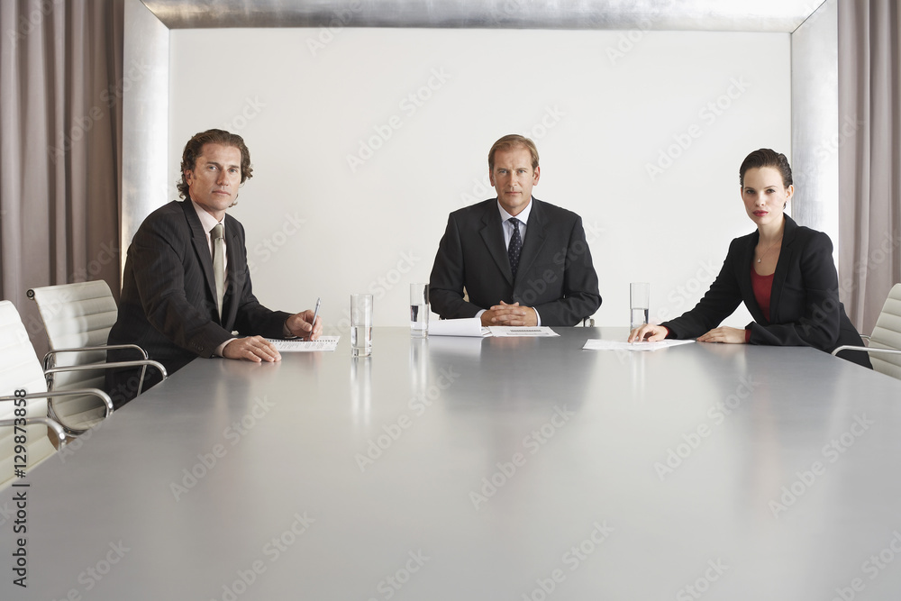 Portrait of confident multiethnic business people in conference room Portrait of confident multiethnic business people in conference room