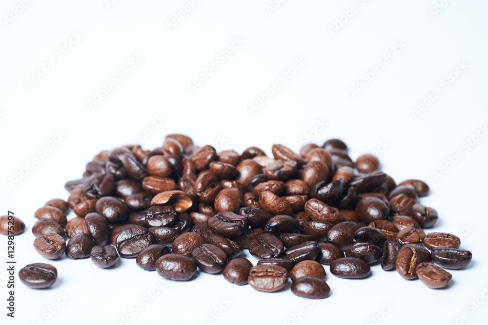 Whole coffee beans on white background, fresh and aroma concept. Whole coffee beans on white background, fresh and aroma concept.