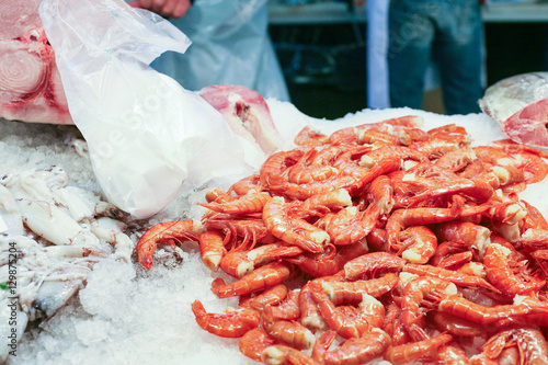 shrimps on ice in market in Venice city
