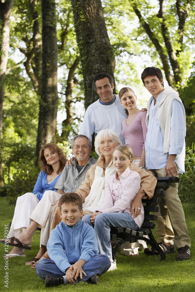 Portrait of happy multi generation family in park Portrait of happy multi generation family in park
